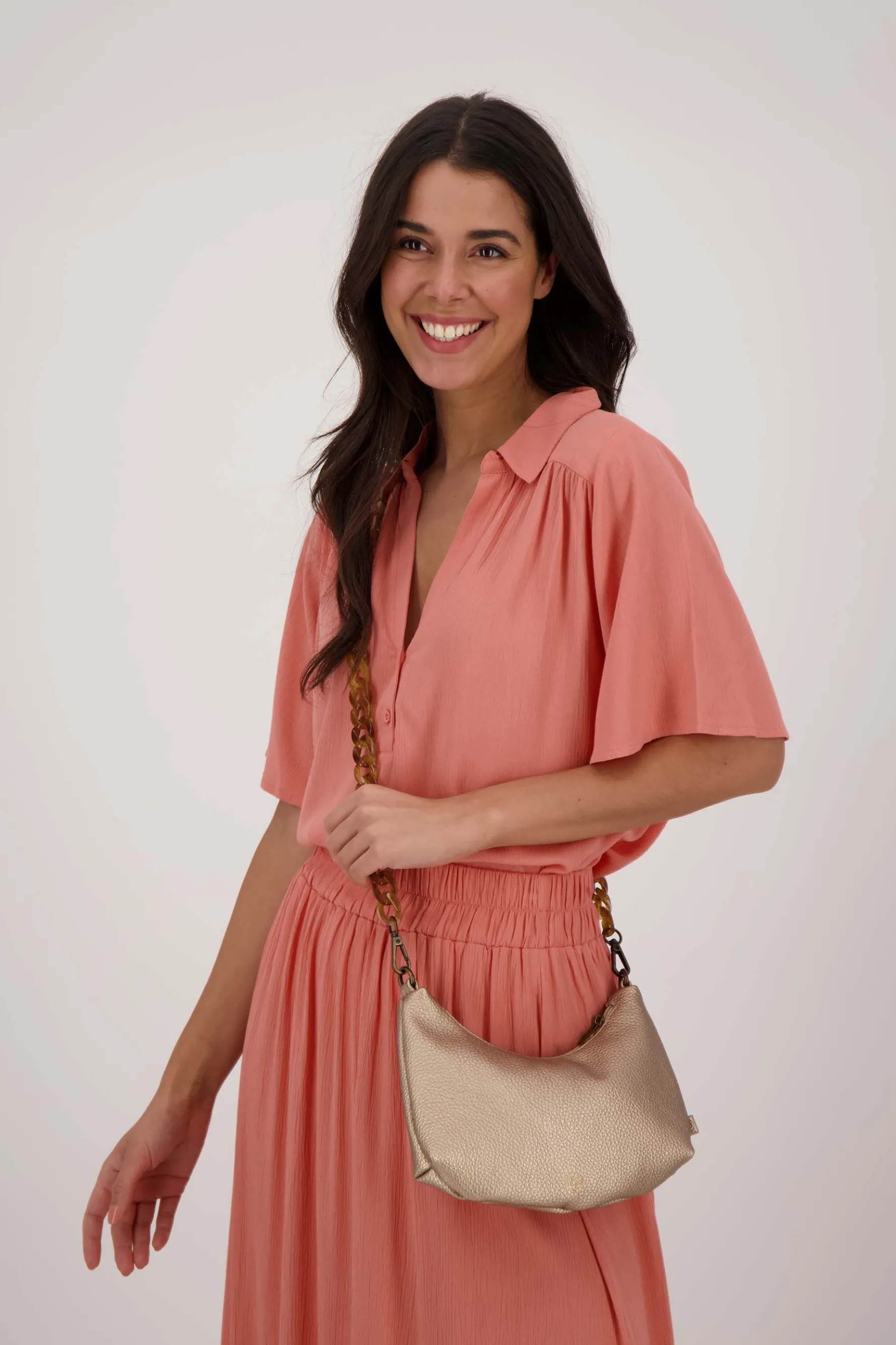 zusss schoudertasje met hornen hengsel goud